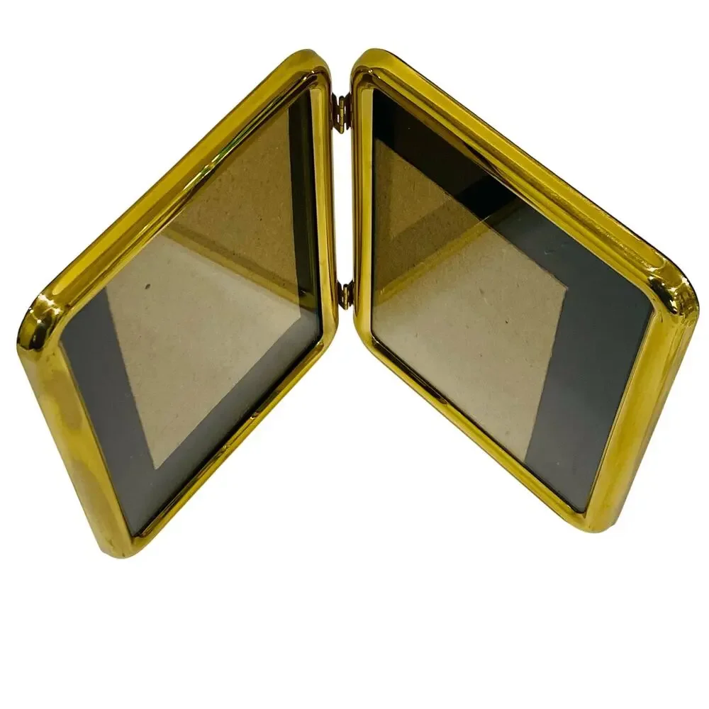 Vintage 1980's double brass photo frame free standing book style holds two 5 x 7